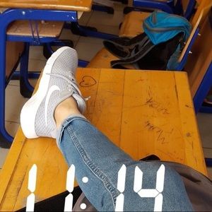 Gray and White Nike’s